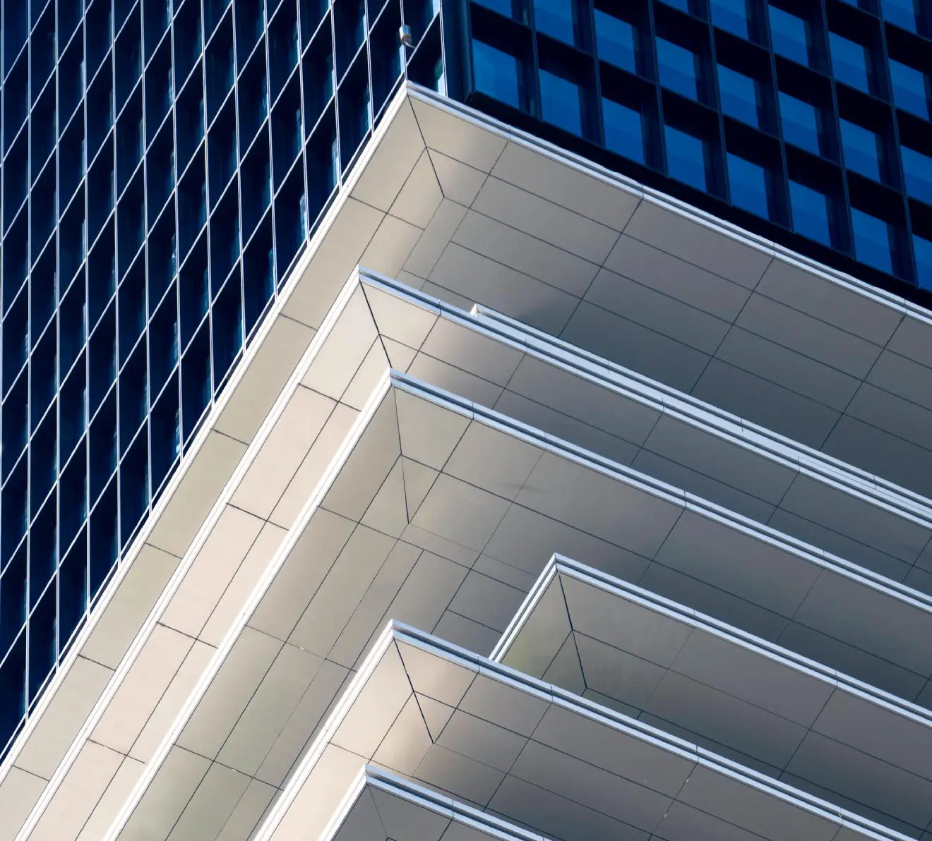 Modern architectural structure with layered geometric design representing infrastructure planning and scalability