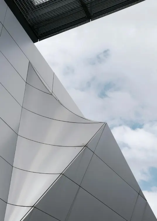 Modern architectural facade with geometric lines and clean structural design